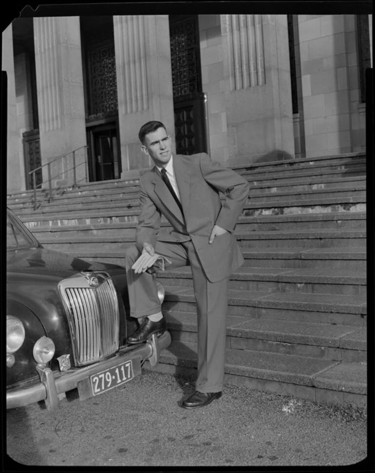 Image: Man modelling suit, leaning on MG car, Dominion Museum, Wellington