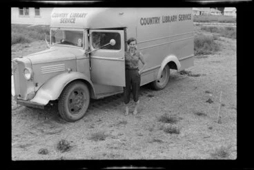 Image: Unidentified woman standing beside the Country Library Service van, Kawerau