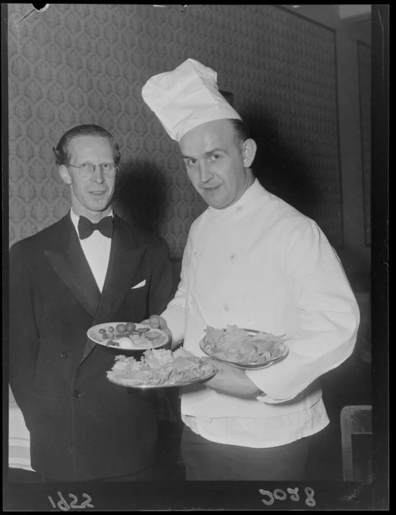 Image: Chef with plates of food for guests at a fashion parade in Wellington