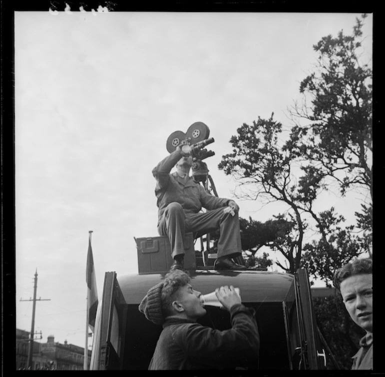 Image: Members of the National Film Unit taking a break, VE day, Wellington