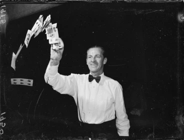 Image: Cecil Morris doing magic card tricks
