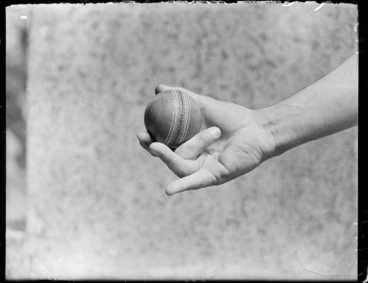 Image: Cricketer's grip on a cricket ball