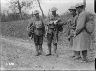 Image: New Zealand soldiers during World War I, with a wounded dove, at Mailly-Maillet, France