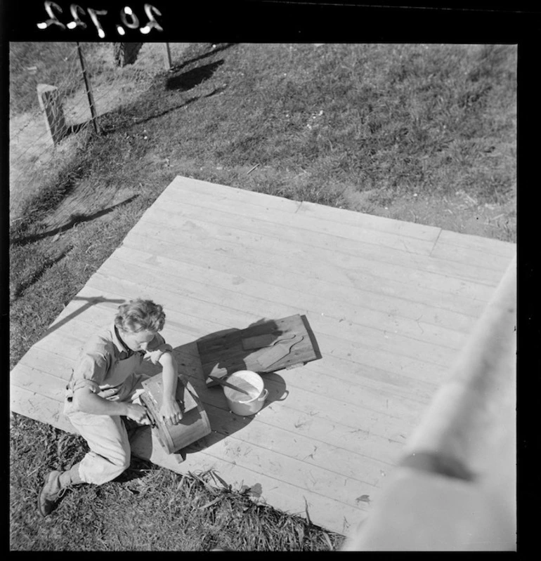 Image: Land girl, Carol Sladden, churning butter, Mangaorapa, Hawke's Bay