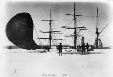 Image: Group alongside a ship and a hydrogen balloon, 1901-4 British Antarctic expedition
