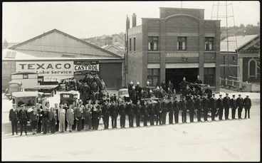 Image: Crown Studio (Gore), fl 1940s : Photograph taken at Gore, Southland, showing staff of a fire brigade; a fire brigade auxillary; and an Ambulance Transport Section of the Women's War Service Auxiliary