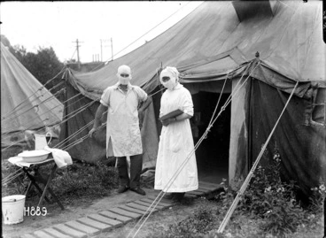 Image: A New Zealand nurse and orderly outside the diphtheria ward, New Zealand Stationary Hospital, France