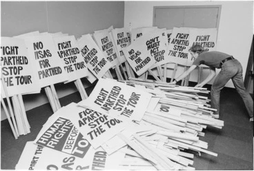 Image: Geoffrey Walker arranging placards for use during an anti-Springbok tour demonstration in Wellington