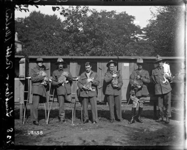 Image: World War I amputees with rabbits at the Walton-on-Thames Hospital, England