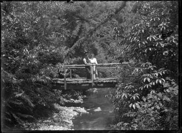 Image: Albert Percy and Laura Godber on a footbridge over the Korokoro Stream.