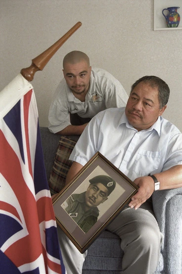 Image: William and Hoa Awatere with a photograph of their uncle and brother who was killed serving in the Vietnam war - Photograph taken by John Nicholson