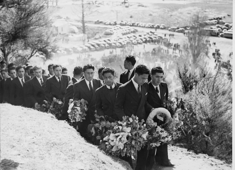 Image: College school boys holding flowers on their way to Sir Apirana Ngata's funeral