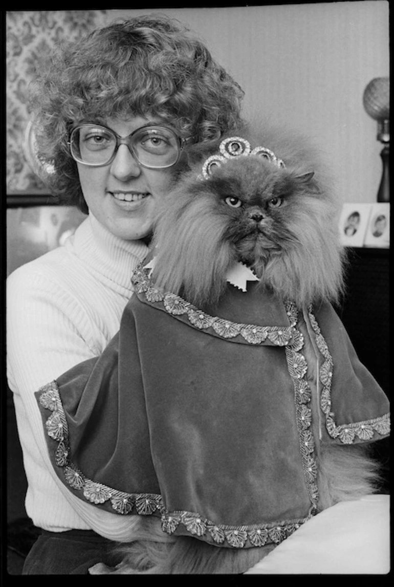 Image: Champion cat, Natasha, wearing tiara and robes - Photograph taken by Paul Reid