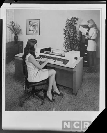 Image: Woman working with computers in office