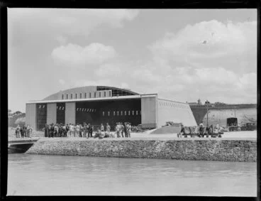 Image: View of large group of people and hangar, Hobsonville