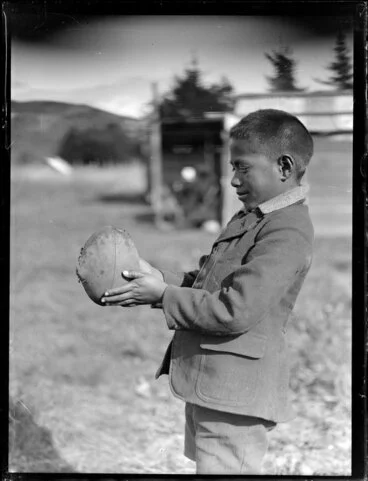 Image: Maori boy with a rugby ball, Waikato