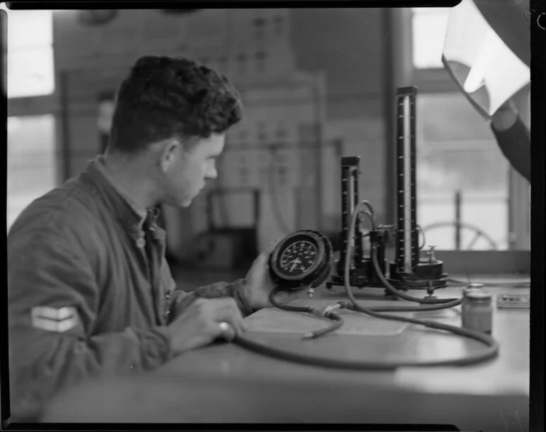 Image: Corporal J R O'Connell repairing air speed calibrator, Wigram, Christchurch