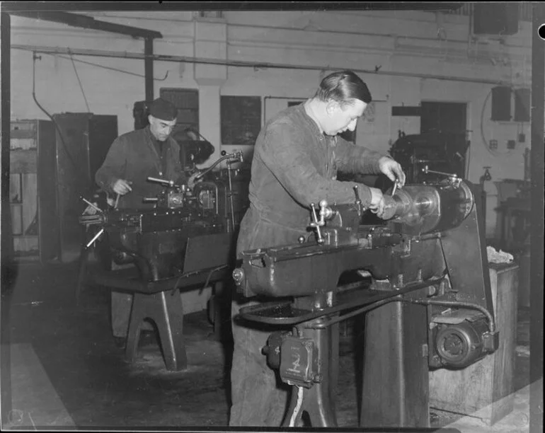 Image: Leading Aircraftmen, B Carter and H Unwin working on lathes, Wigram, Christchurch