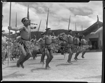Image: Group of unidentified Maori doing Haka at Sir Peter Bucks welcoming ceremony