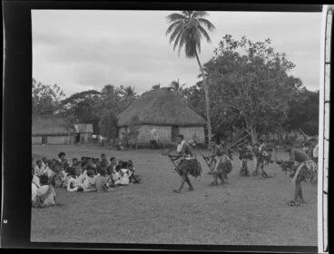 Image: Older boys performing a spear dance at the meke, Vuda village, Fiji
