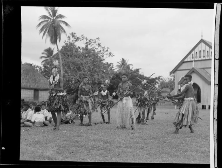 Image: Boys performing a spear dance at the meke, Vuda village, Fiji