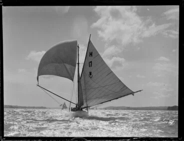 Image: Yacht (with thistle, number 17 and character H printed on sail), Waitemata Harbour, Auckland Region