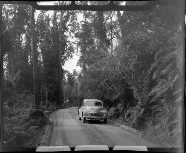Image: Morris Minor car on the road near the township of Ross, West Coast