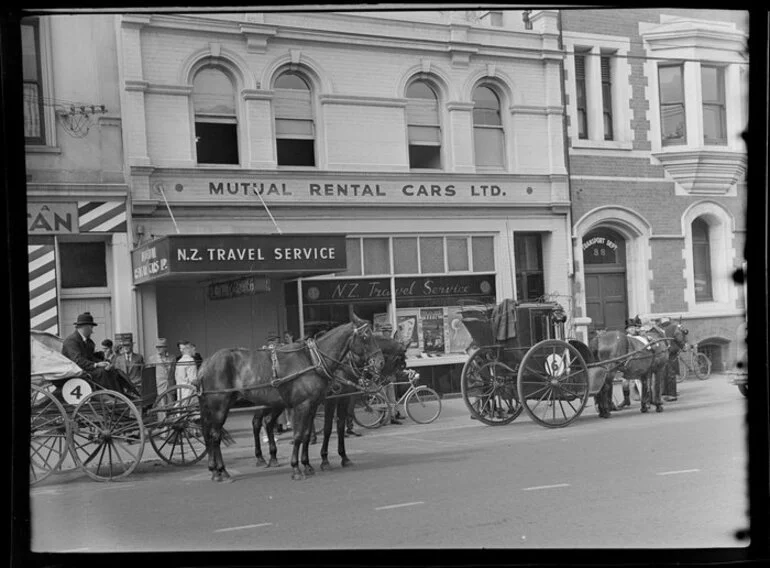 Image: Christchurch Centennial celebrations, horses and buggies outside New Zealand Travel Service office