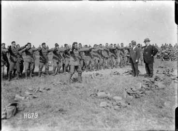 Image: Members of the Pioneer Battalion performing a haka for ministers Massey and Ward, Bois-de-Warnimont, France
