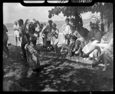 Image: Unidentified local woman, possibly Augustine, performing the hula at a ceremony feast, Tahiti