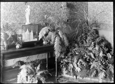 Image: Entrance hall of home of Mr & Mrs F Samuel, 94 Molesworth Street, Wellington, showing table, statues and potted ferns