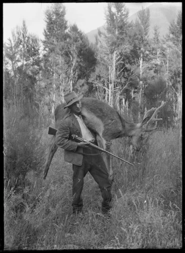 Image: Hunter with deer