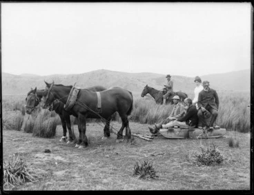 Image: Lydia Williams and unidentified men on a horse-drawn wooden sled, at Whakaki, Wairoa District