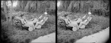Image: An unidentified woman, Miss Rowbottom of Shakespeare Terrace (seated on right), and Lydia Myrtle Williams (in hammock), all of whom are holding banjos, in the garden of Lydia and William Williams' Carlyle Street home, Napier, Hawkes Bay Region
