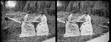Image: Lydia Myrtle Williams (right) and an unidentified woman playing chess at table in the garden of Lydia and William Williams' house, Carlyle Street, Napier, Hawkes Bay Region, including hammock