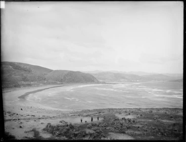 Image: Unidentified group of men at Plimmerton Beach, Wellington Region, including Porirua Harbour in background