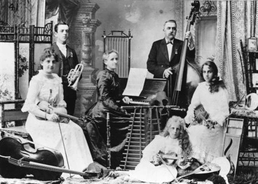 Image: The Black family, also known as the Musical All Blacks of Maori Land, with their musical instruments