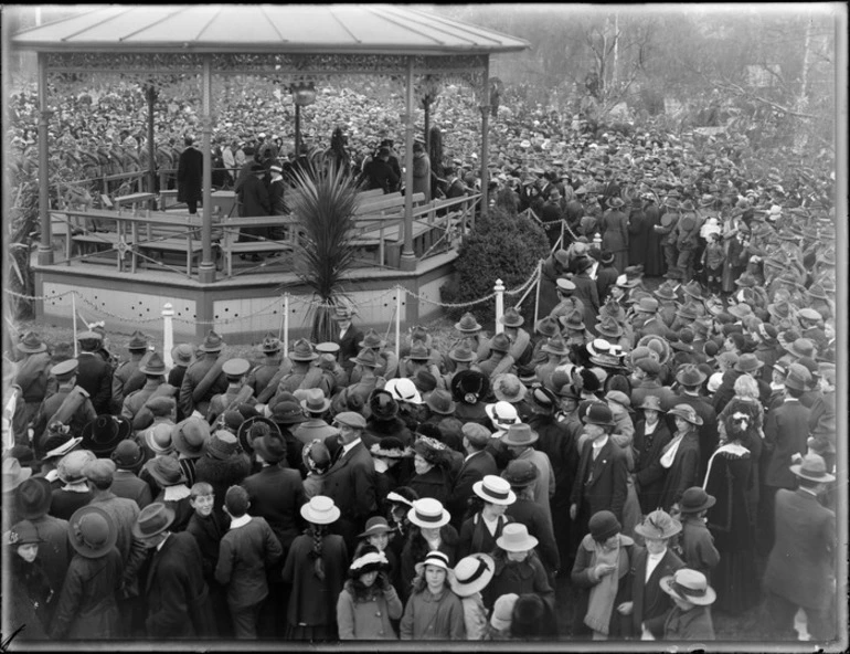 Image: Crowds standing around a band rotunda in Victoria Square, Christchurch, at a farewell ceremony for World War I troops