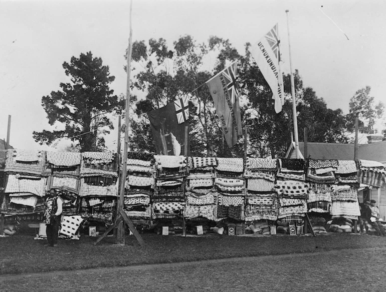 Image: Maori cloaks and flags on display at 100 Putiki Drive, Wanganui, for the tangi for Porokoru Patapu