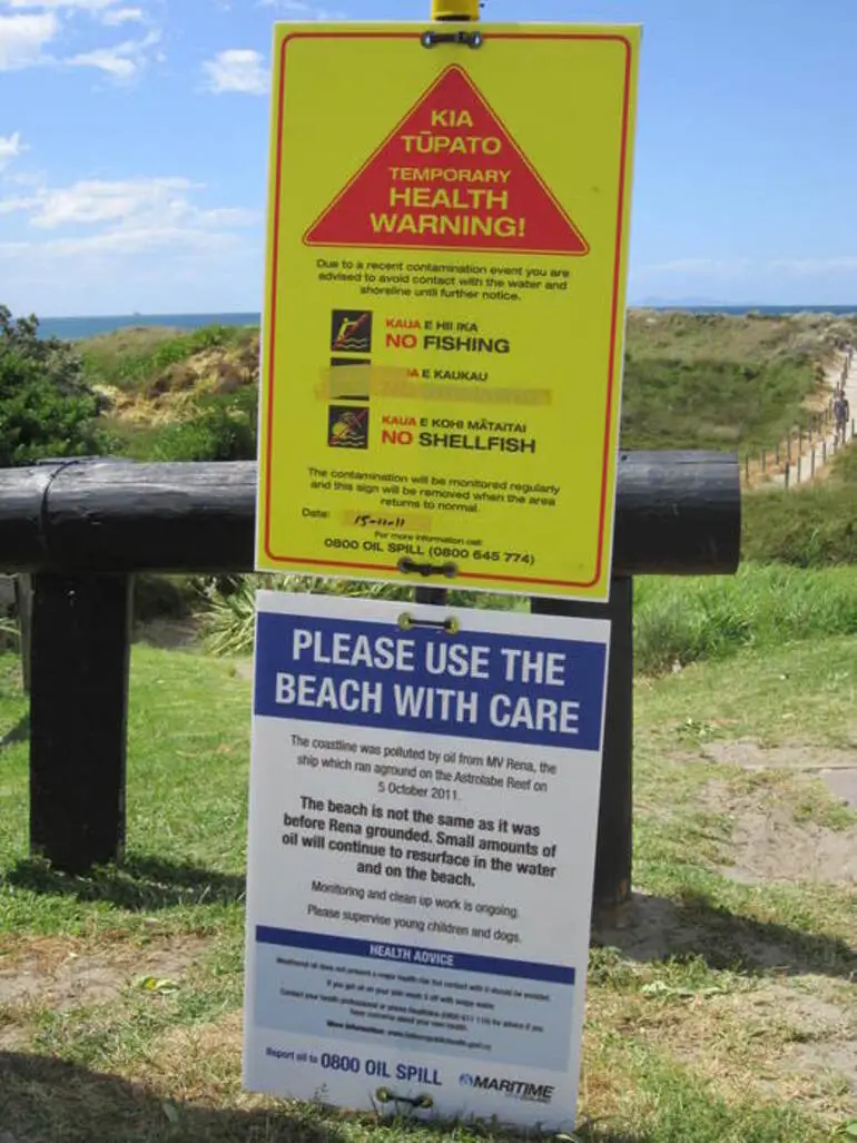 Image: Marshall, Natalie Anne, 1974- :Photograph of signs at Papamoa, Tauranga, warning of oil pollution from the vessel Rena