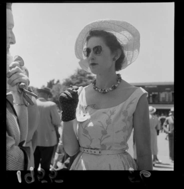 Image: Unidentified woman smoking a cigarette at the Trentham races, Upper Hutt