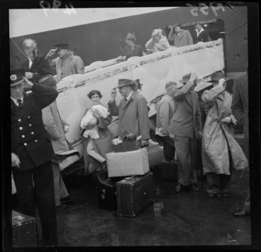Image: Passengers disembarking from the ferry, Maori, on to Clyde Quay wharf, Wellington, on a wet and windy day