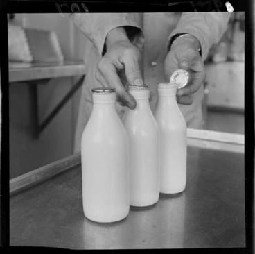 Image: Checking the seal on new bottles, Wellington city milk department