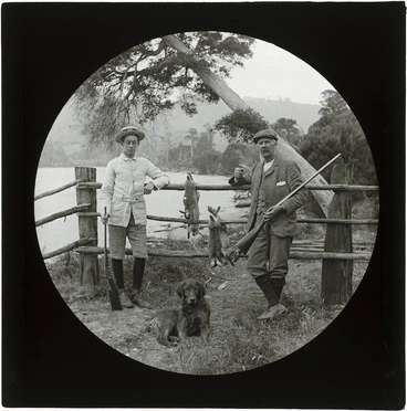Image: Boy and Aubrey Whitcombe, after rabbit hunting, Catlins River, Otago
