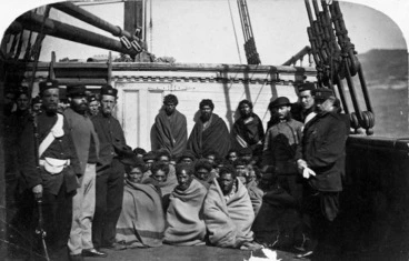 Image: Maori prisoners, members of the Hauhau church, under guard on board a prison hulk in Wellington harbour