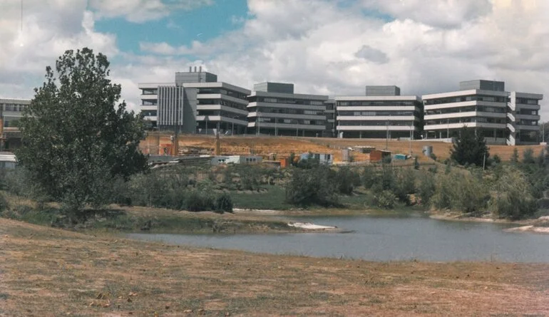 Image: F, E, D and C Blocks across Chapel Lake