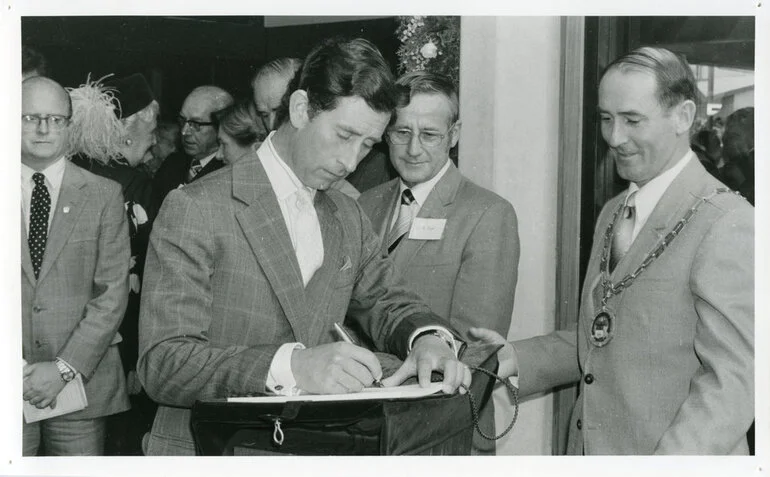 Image: Prince Charles signing book 1983