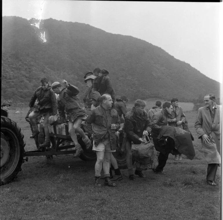 Image: Search and rescue volunteers arrive by tractor, 1963