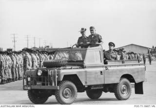 Image: Vung Tau, South Vietnam. 1 December 1971. Inspecting the troops at a farewell parade by jeep are, Commander of the Allied Forces in Vietnam, General Creighton W. Abrams and two other officers. The ..