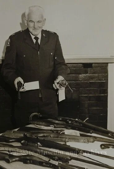 Image: Constable Ray Currie with firearms